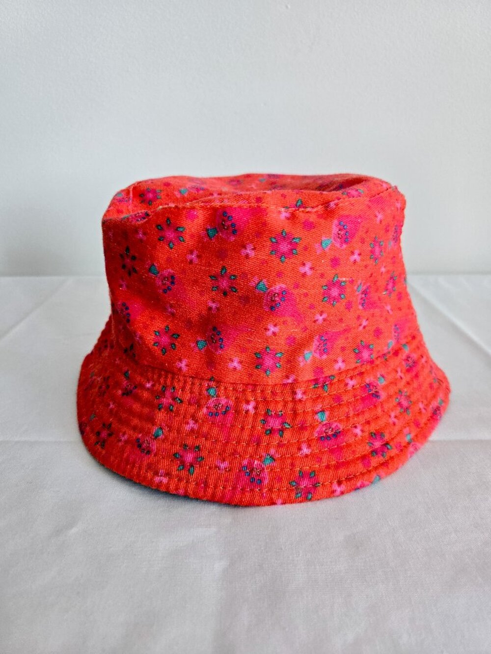 2/$20 Kids Trolls Reversible Bucket Hat | Poppy & Teal